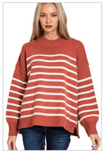 Exposed seam striped oversized sweater