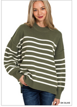 Exposed seam striped oversized sweater